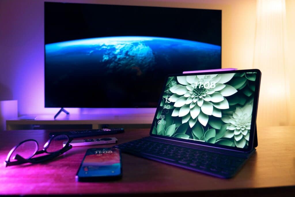 How to Set Up IPTV: The Complete Guide for Every Device Laptop and tablet set up on a desk